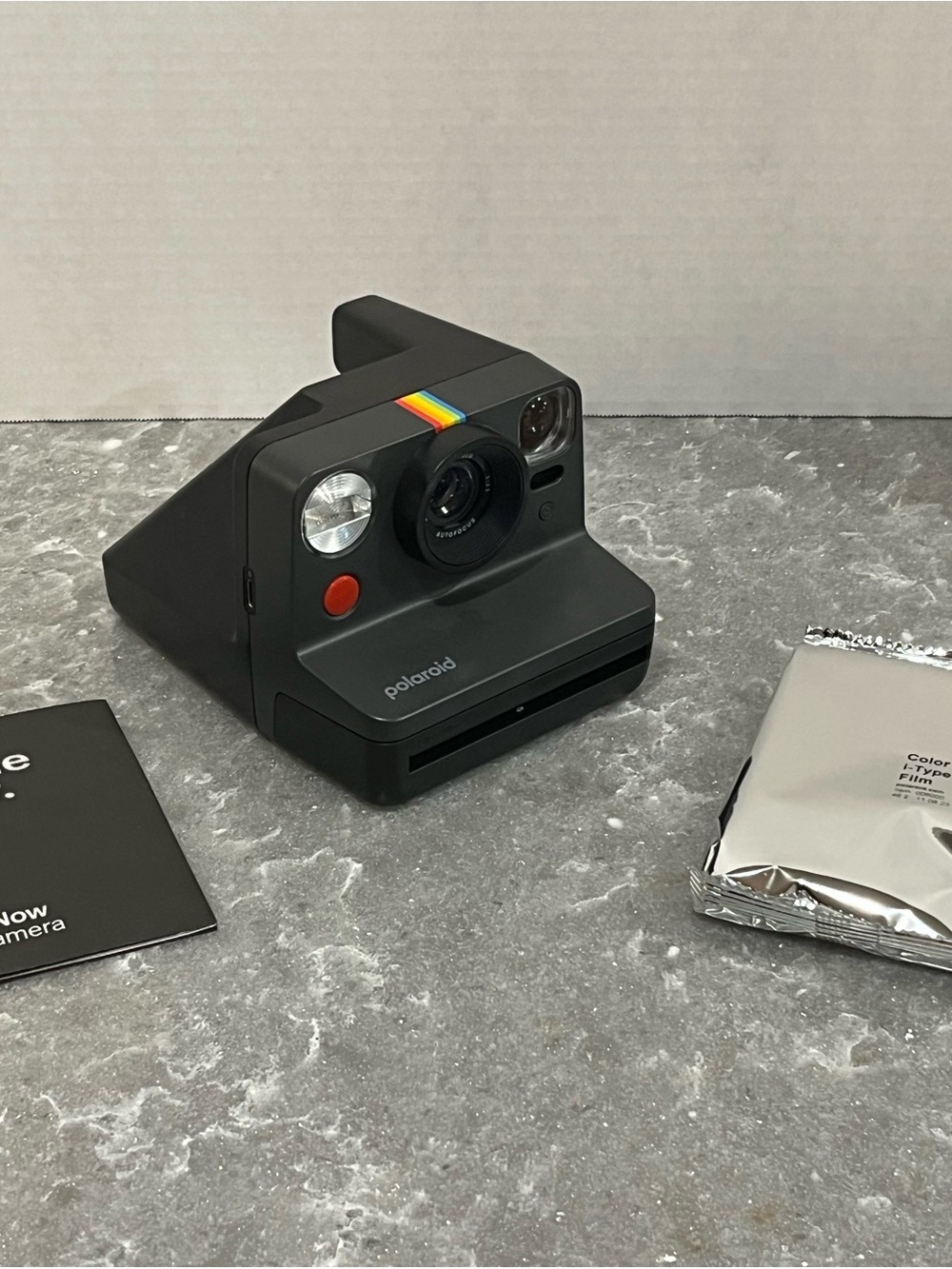 Polaroid Now Black Instant Camera with Rainbow Stripe Accent and Film